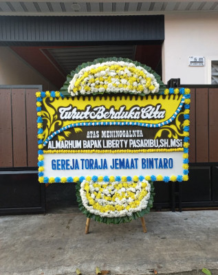 Papan Bunga Duka di Waropen
